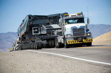 WHAT ARE THE BENEFITS OF HAVING A CDL? CDL School in Dallas, Will Unlock Your Future! CDL School in Dallas TX - A bustling classroom with students and an instructor discussing truck driving strategies. CDL School In Dallas How to reach the CDL Licence?